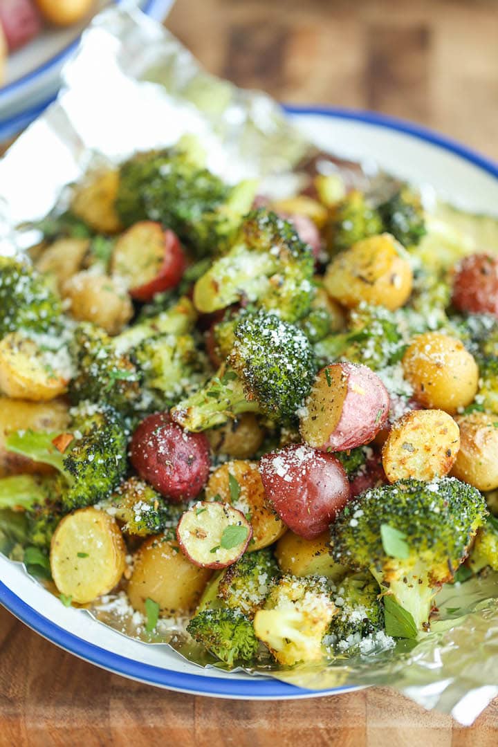 Broccoli and sliced potatoes topped with grated parmesan cheese.