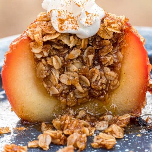 An apple cut in half to reveal oat and sugar filling.