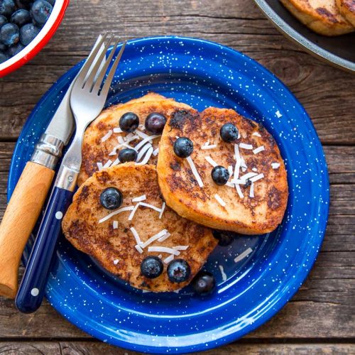 Three slices of French toast on a blue plate