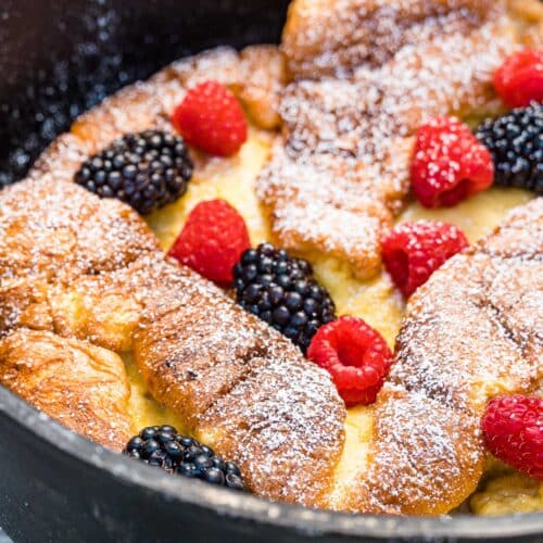 Dutch Baby pancake with powdered sugar and berries
