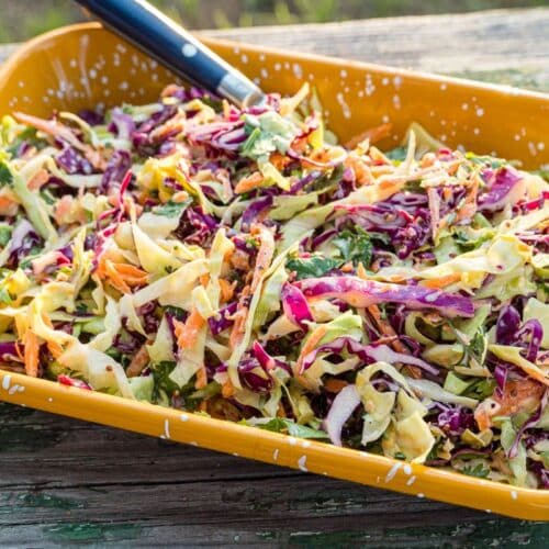 Coleslaw in a yellow dish.