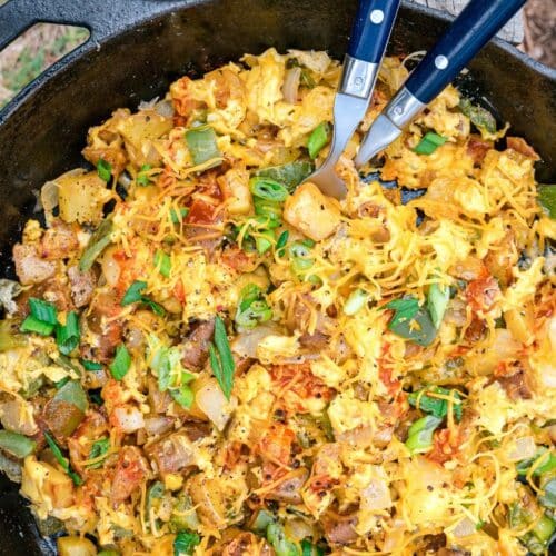 Mountain skillet topped with scallions and hot sauce
