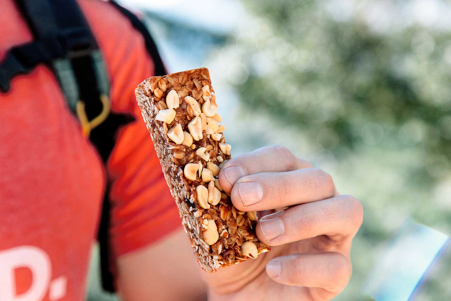 Michael holding a PB&J granola bar